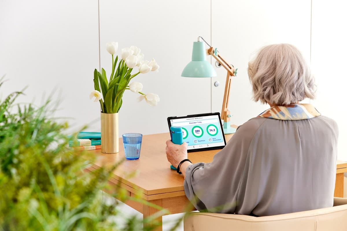 Older adult smiling confidently in a retirement community setting