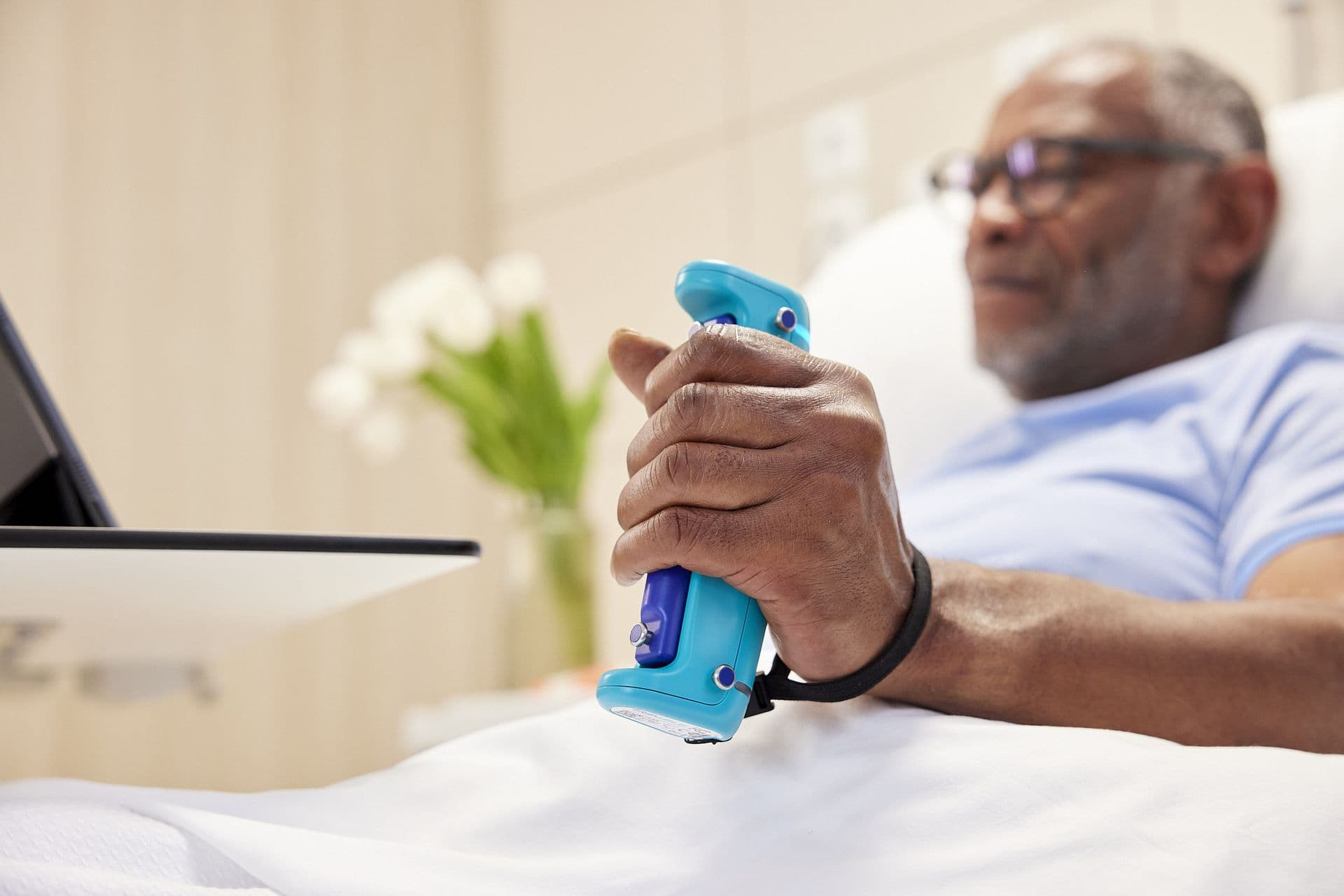 Close-up of patient using GripAble sensor