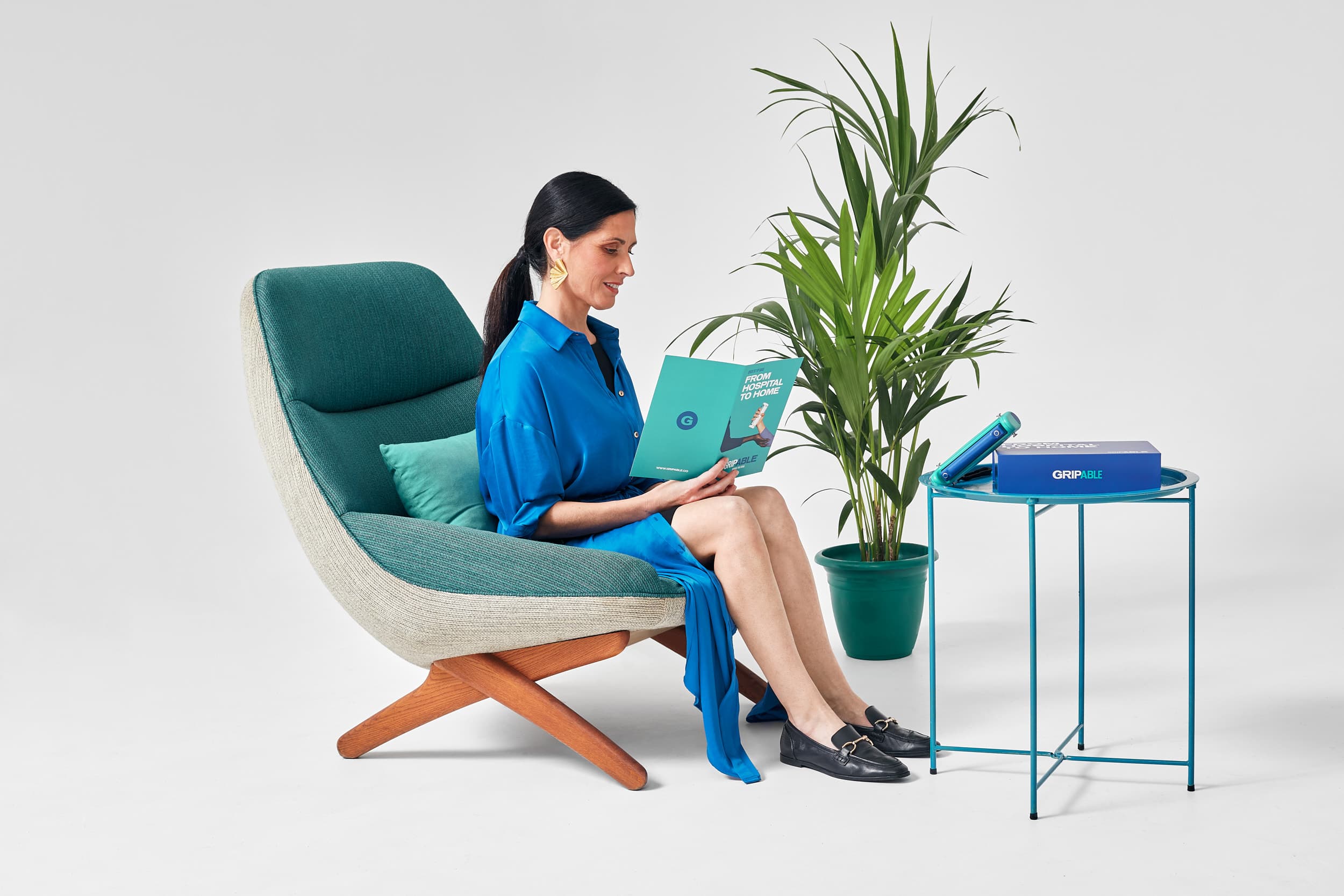 Woman reading Able Care product brochure